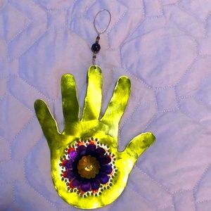 Small metal wall art made by Kipling Creations.